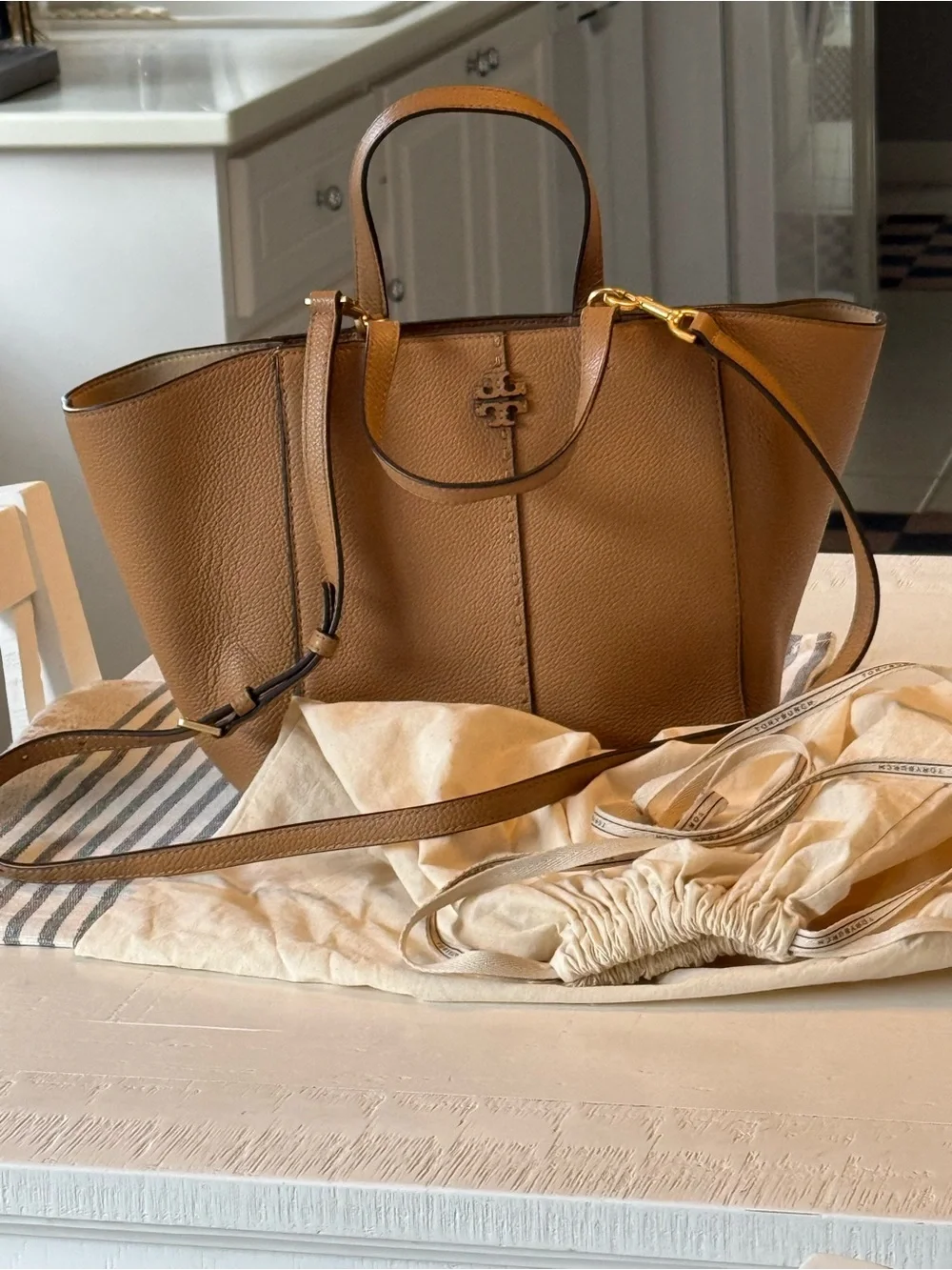 Tory Burch accents gold tone